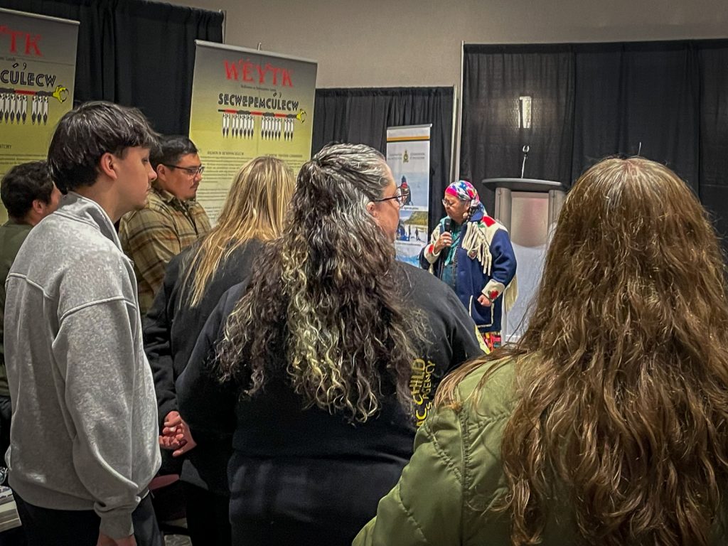 Attendees listen as a member of Secwepemcúl’ecw speaks at the opening of the TRU Career and Experiential Learning Job Fair in Kamloops, British Columbia.